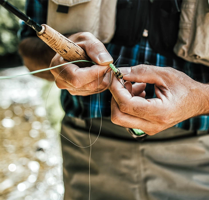 a person holding a string