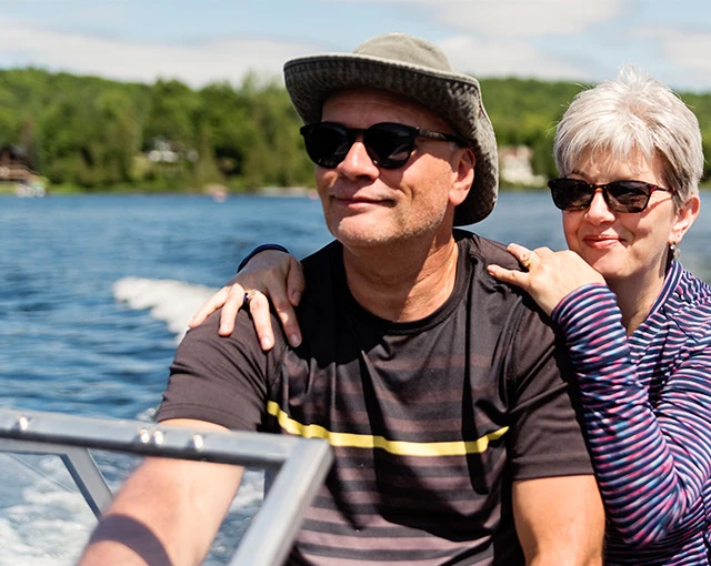 a man and woman on a boat