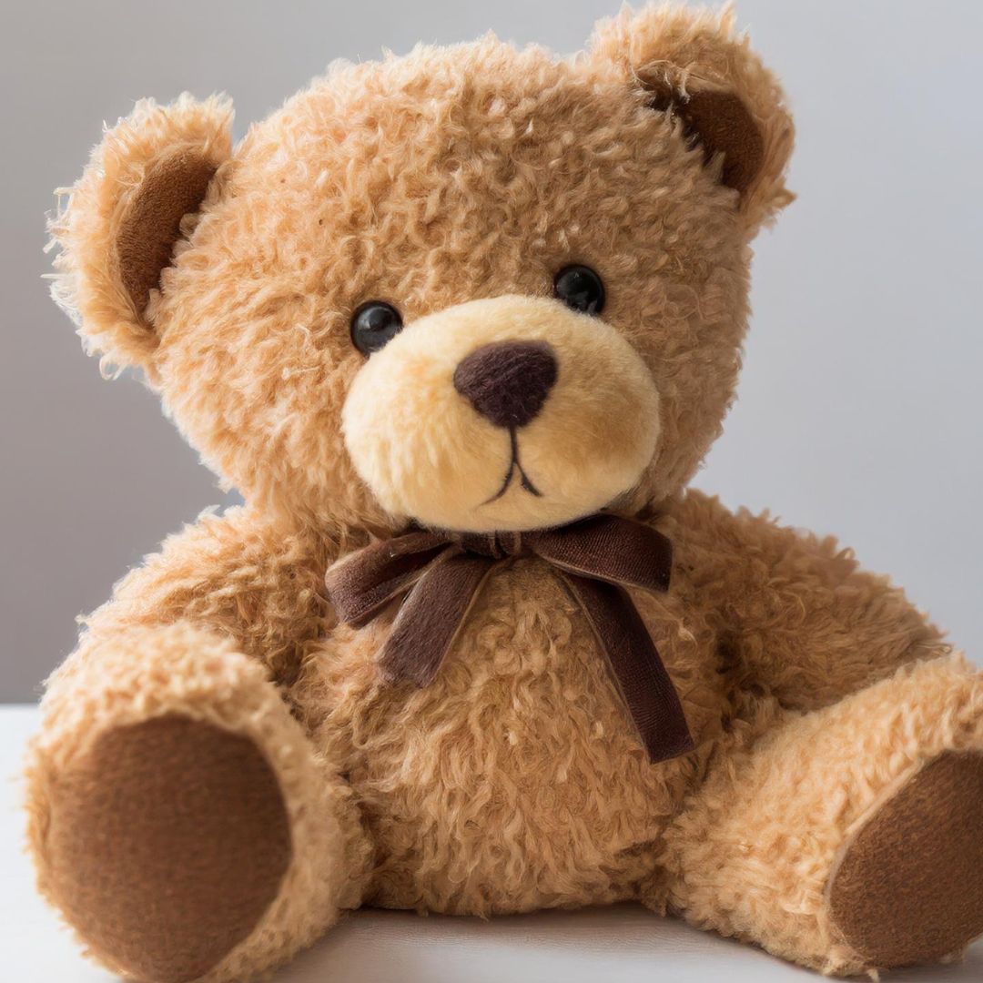 a teddy bear with a bow