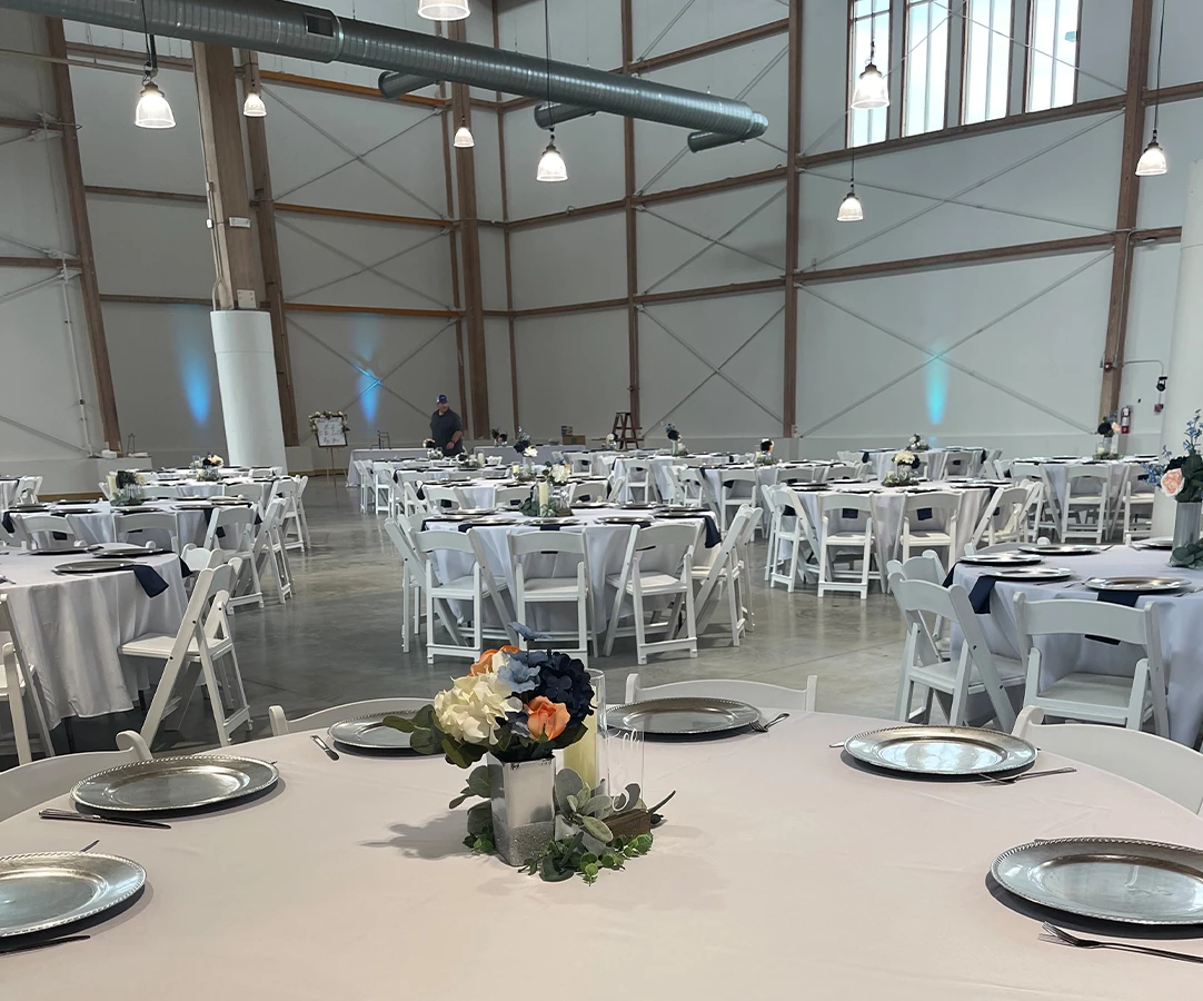 a large room with tables and chairs