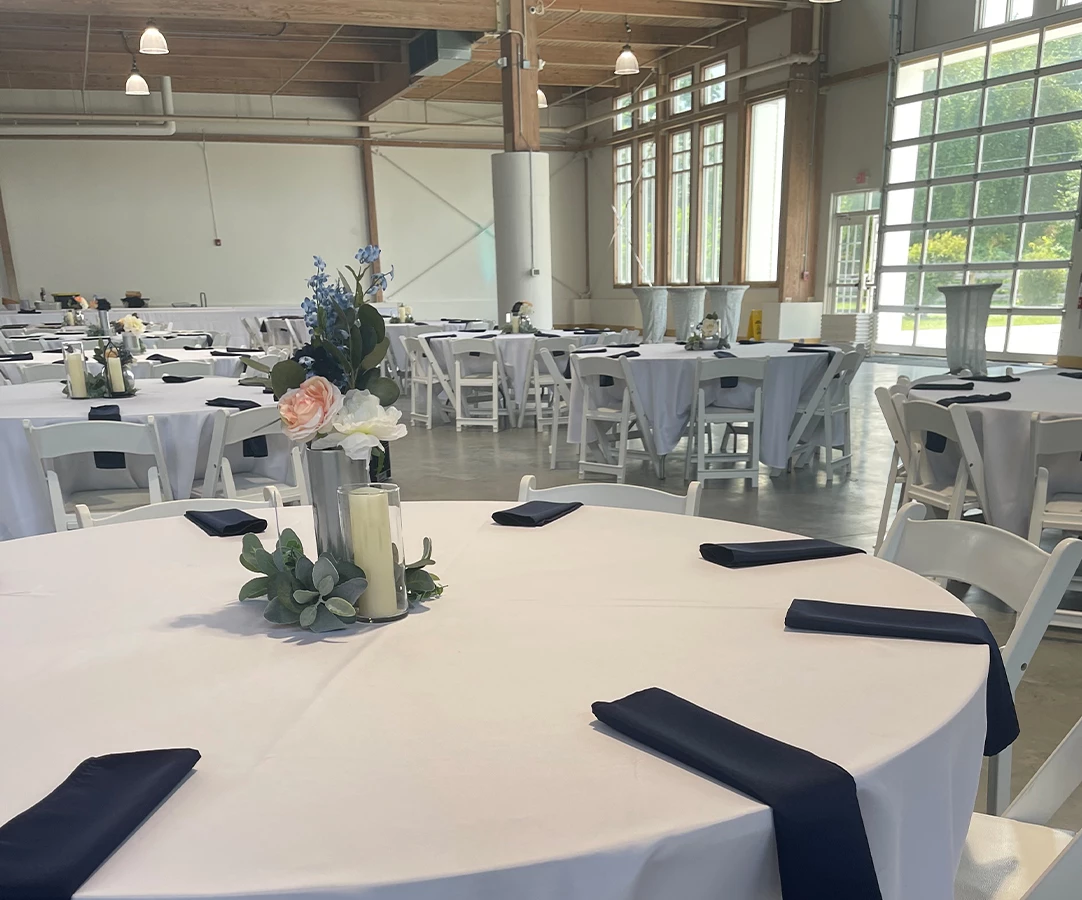 a room with tables and chairs