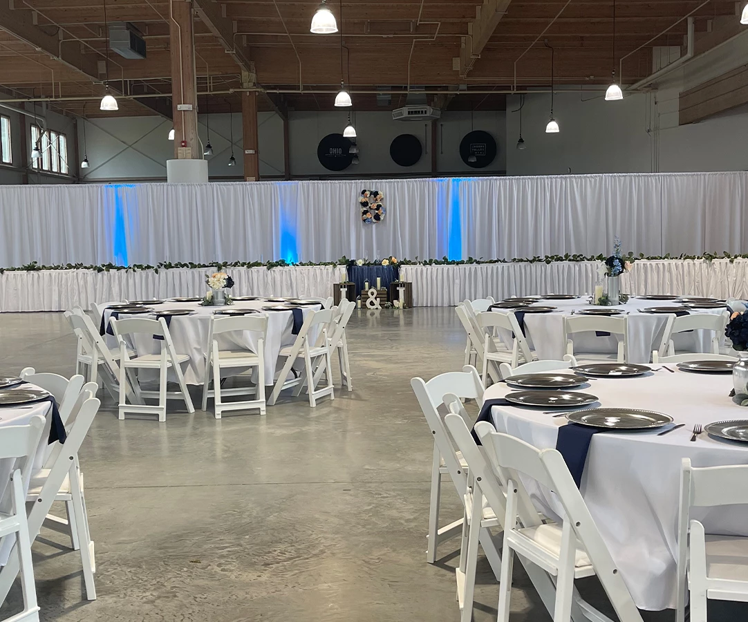 a room with tables and chairs