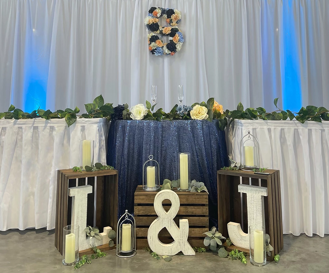 a table with flowers and letters