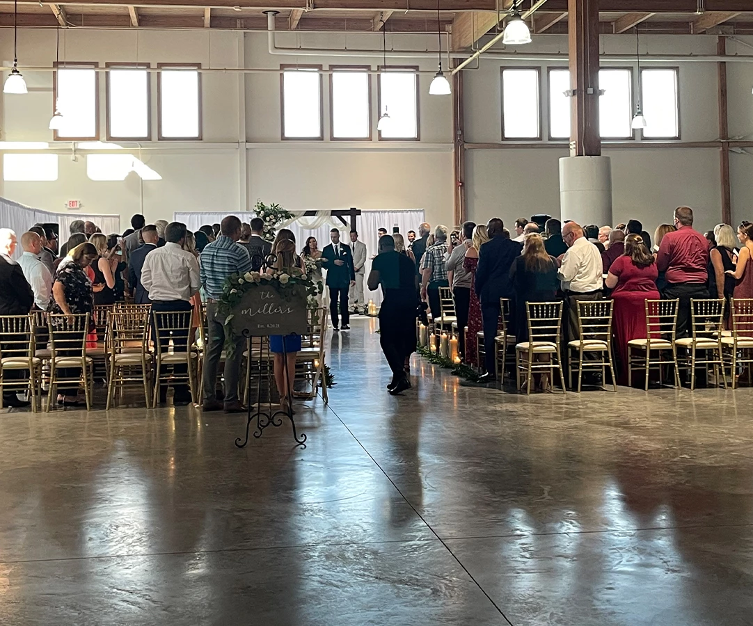 a group of people in a large room