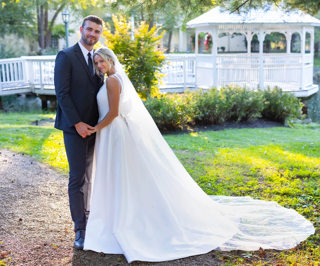 a man and woman in wedding attire