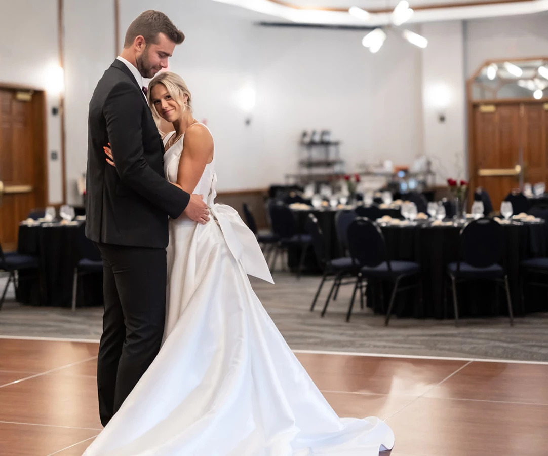 a man and woman in a wedding dress