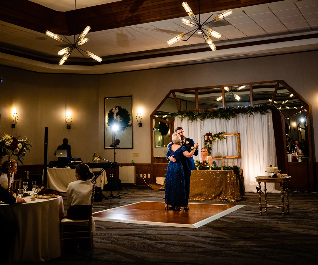a man and woman dancing on a stage