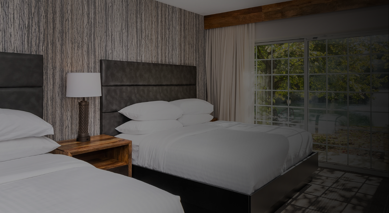 a room with a bed and a window