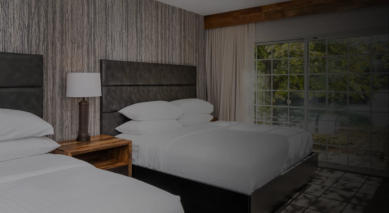 a room with a bed and a window