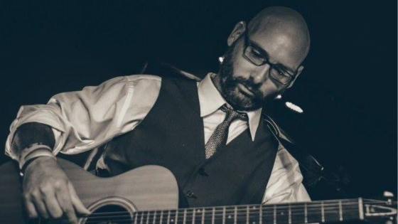 david rice playing a guitar