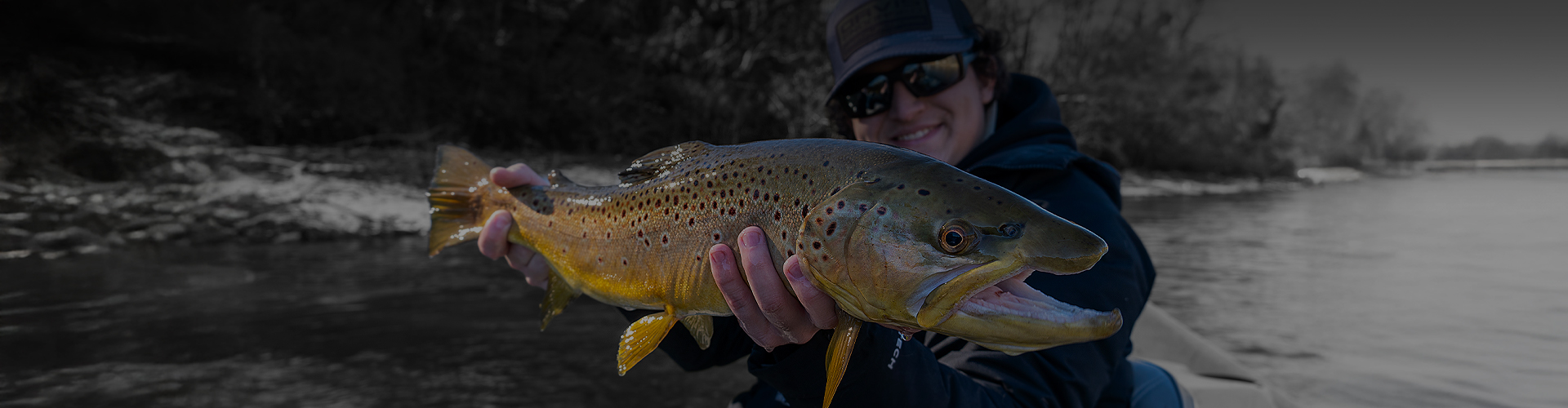 a person holding a fish