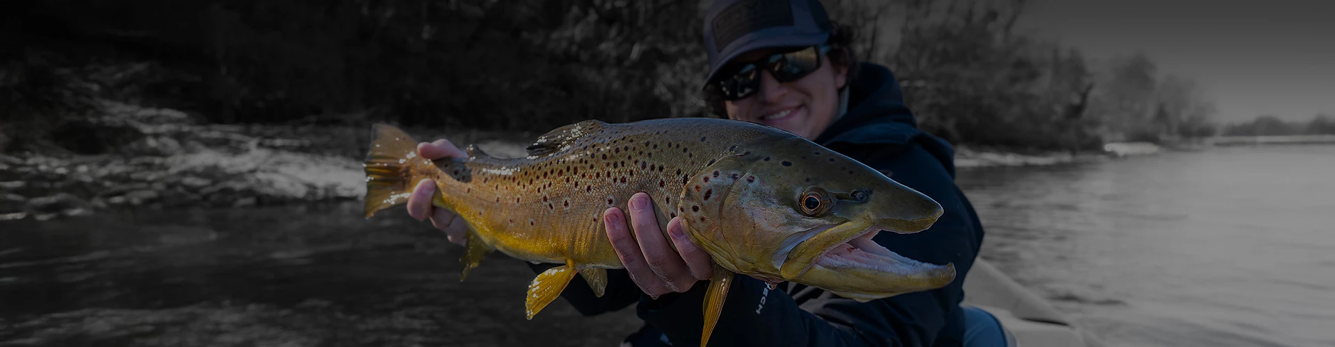 a person holding a fish