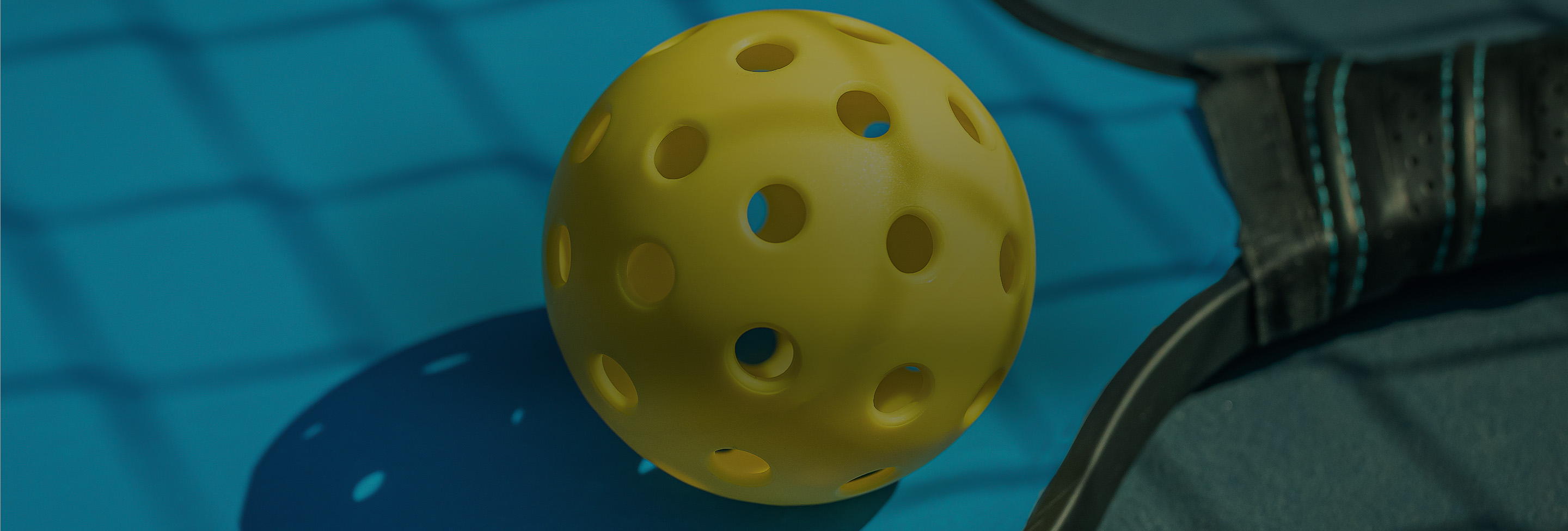 a yellow ball with holes on it