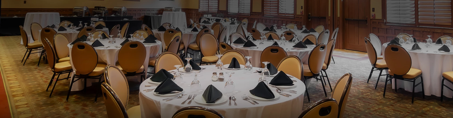 a room with tables and chairs