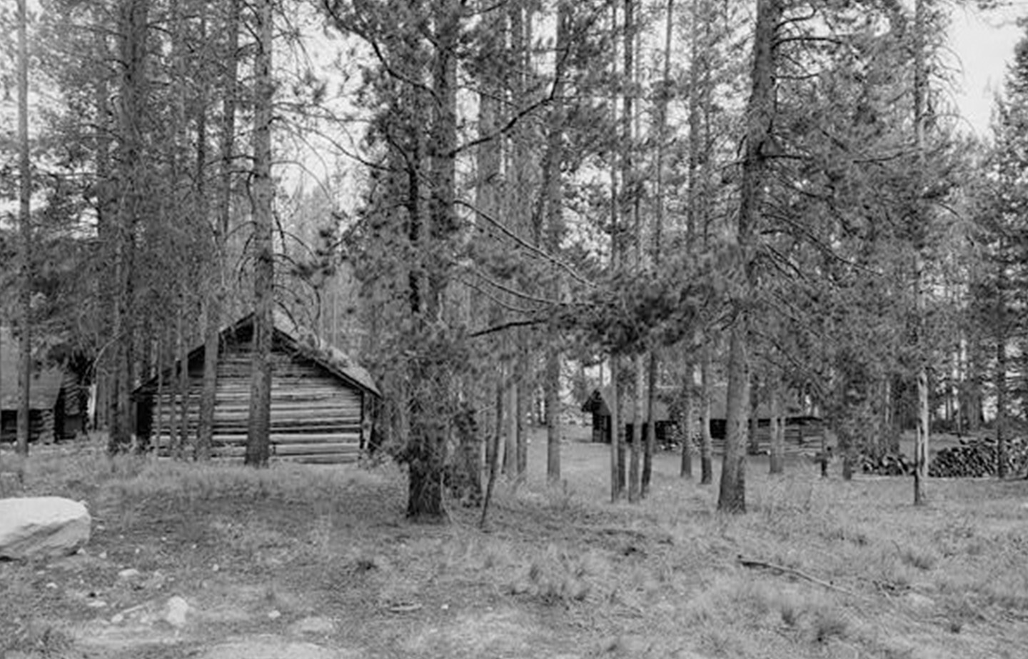 a log cabin in the woods