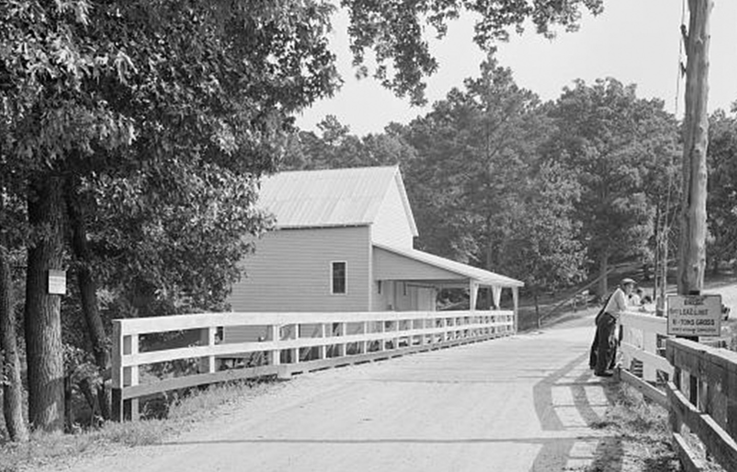 a woman standing on a road