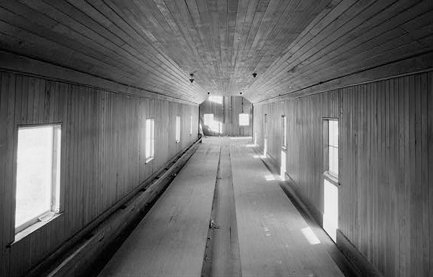 a long hallway with windows