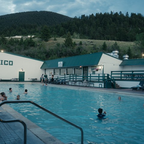 a group of people in the hot springs.