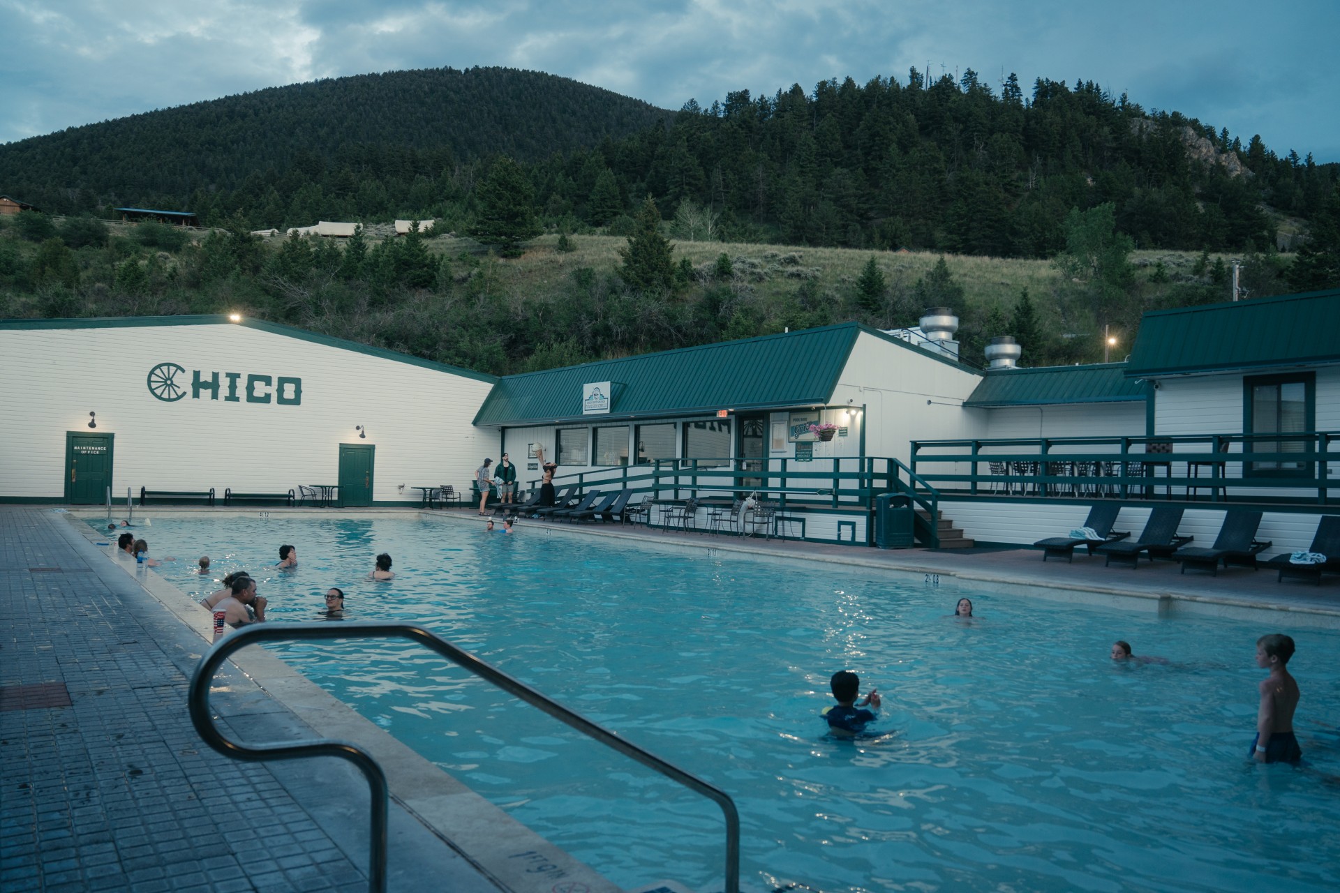 a group of people in the hot springs.