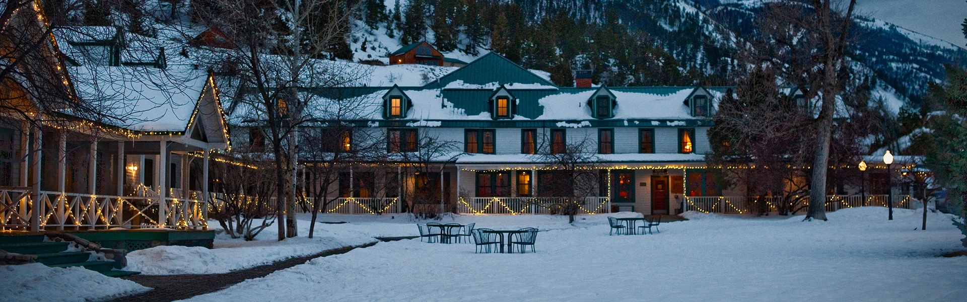 hero image for a house with lights on it