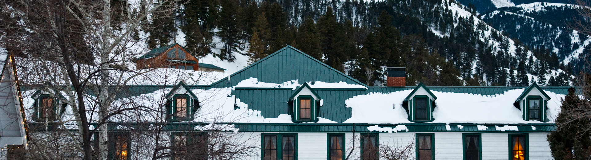 a house with snow on the roof