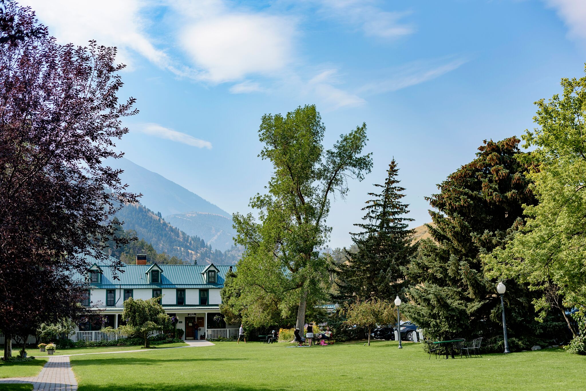 An inn with trees and a lawn