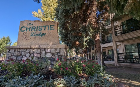 a sign in front of a building