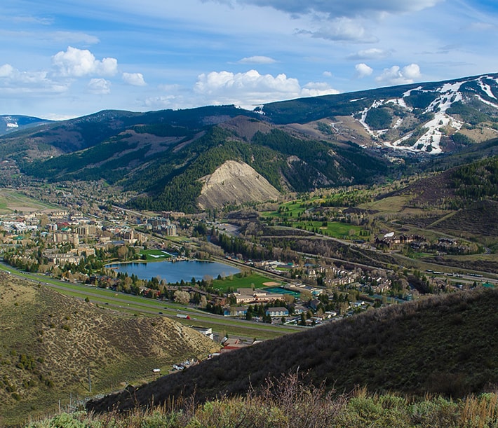 a lake surrounded by mountains
