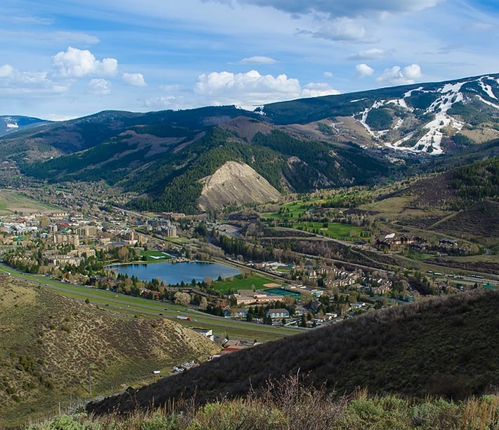 a lake surrounded by mountains