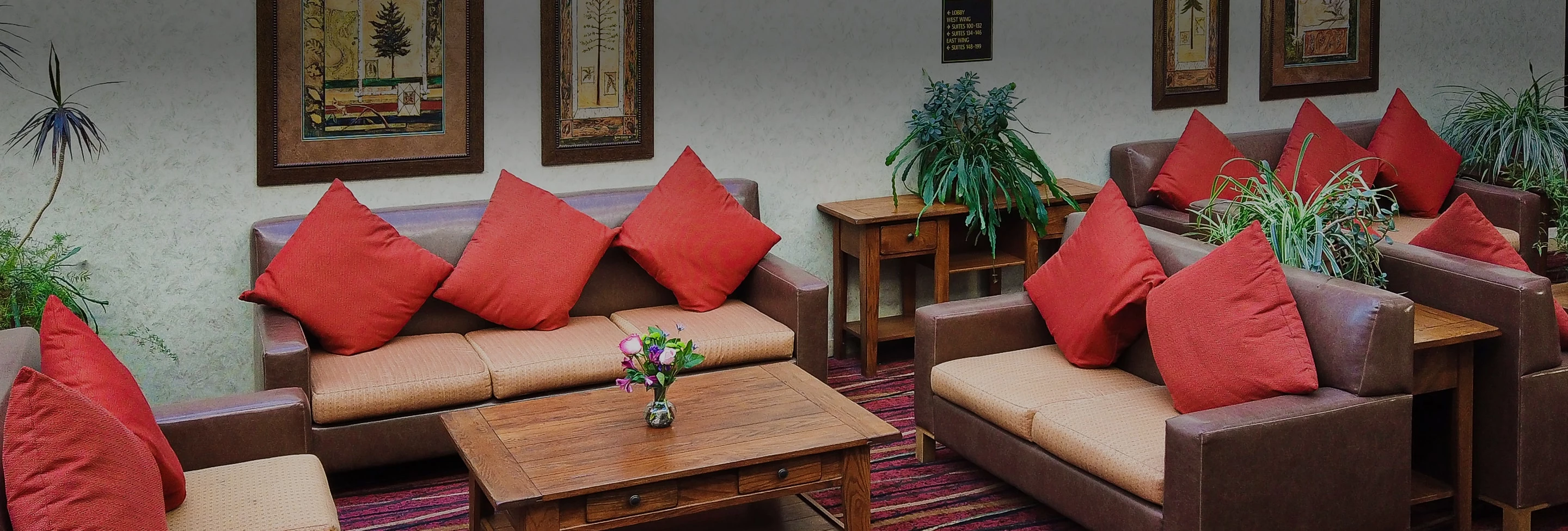 a living room with couches and a coffee table