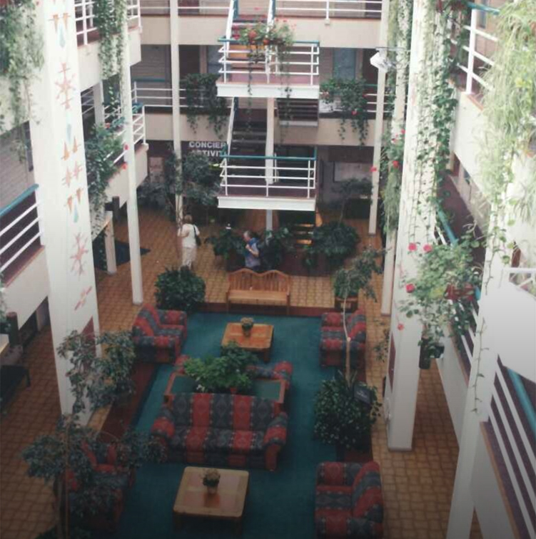 a room with many floors and a couch and chairs