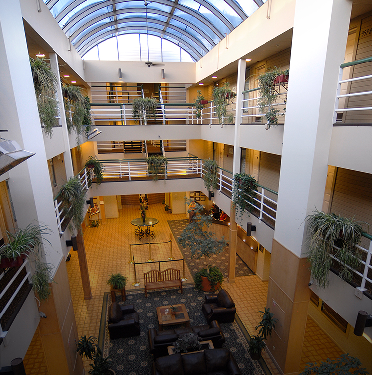 a building with many floors and a glass roof
