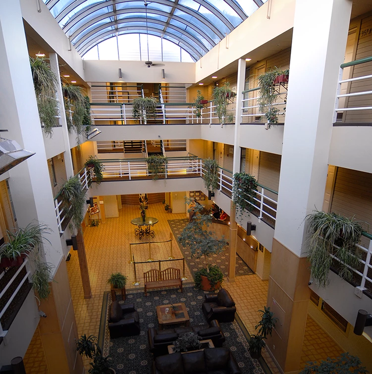 a building with many floors and a glass roof