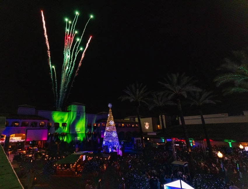 fireworks in the sky over a building
