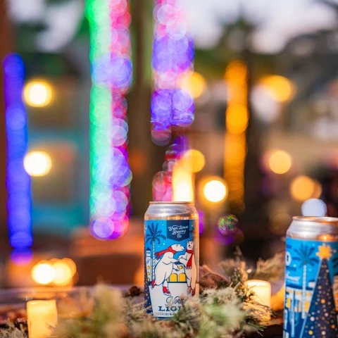 a can of beer on a table