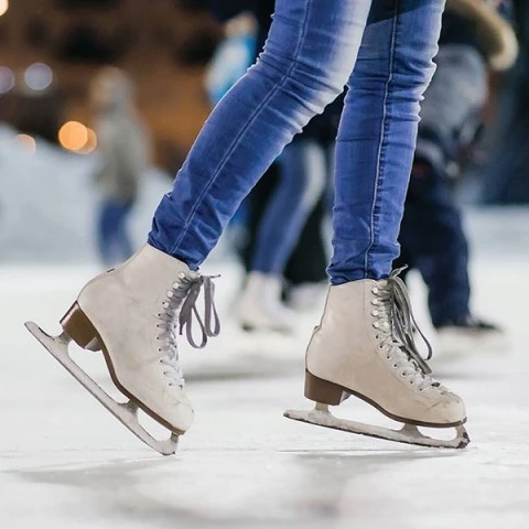 close up of a person wearing ice skates