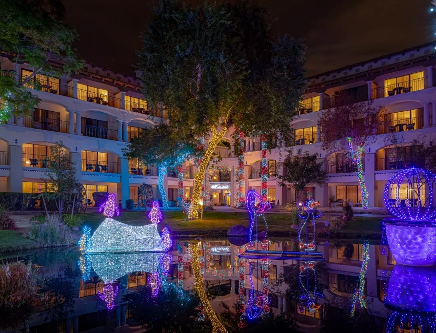 a building with trees and lights