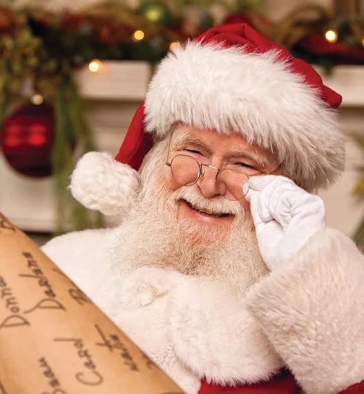 smiling santa with his list