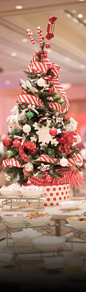 a christmas tree with presents around it