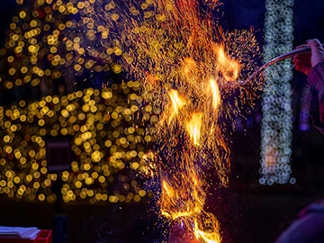 a fire with sparks coming out of it