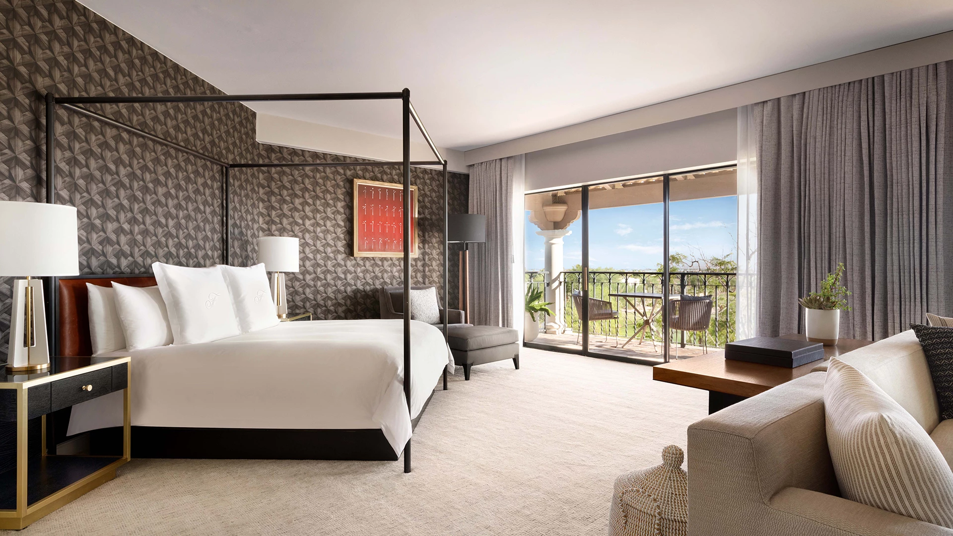 a room with a bed and a balcony