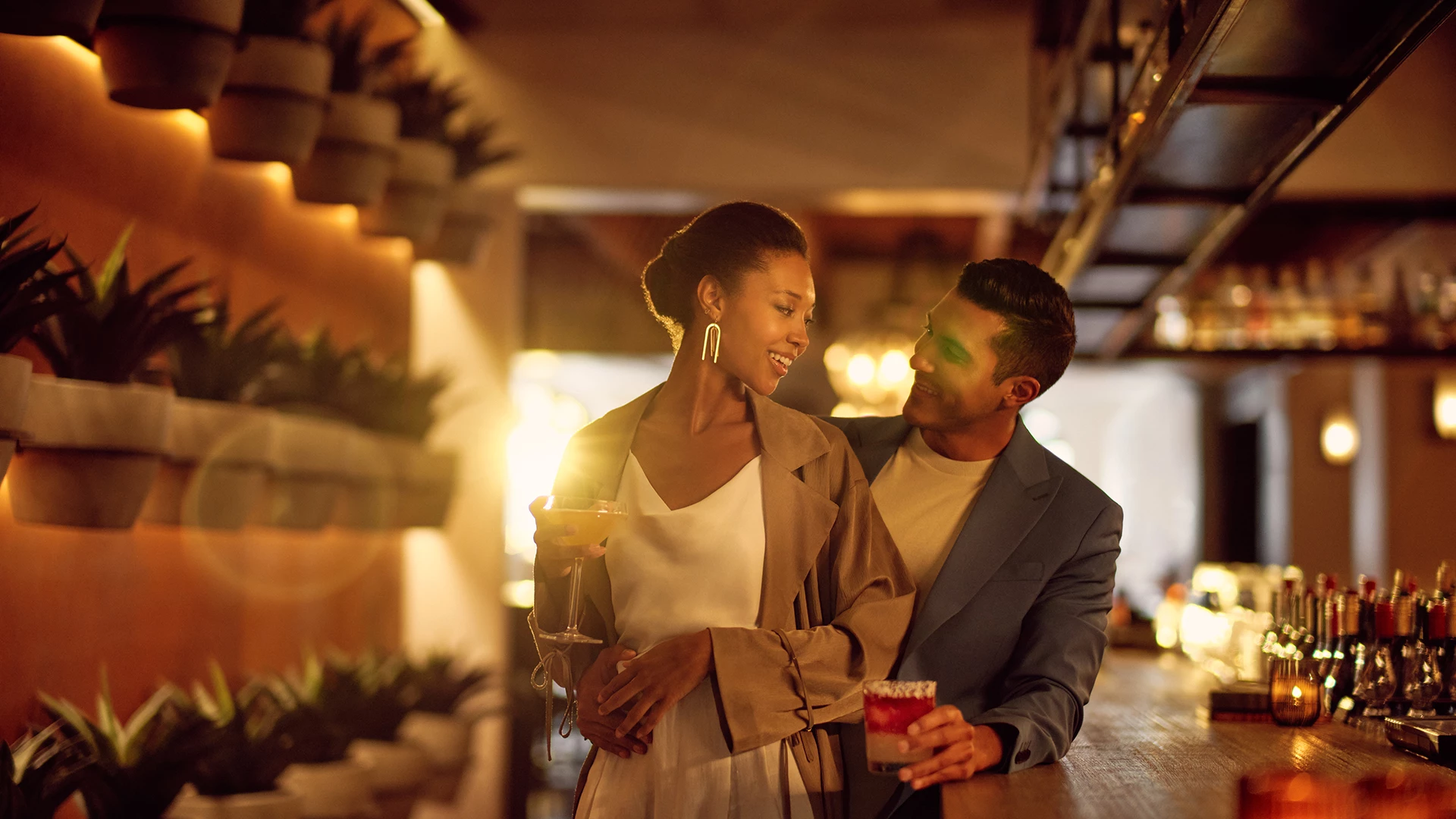 a man and woman standing next to each other