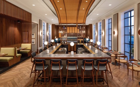 a bar with chairs and a counter main