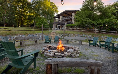 a fire pit with chairs around it main