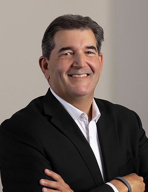 a man in a suit image of Ed Manning