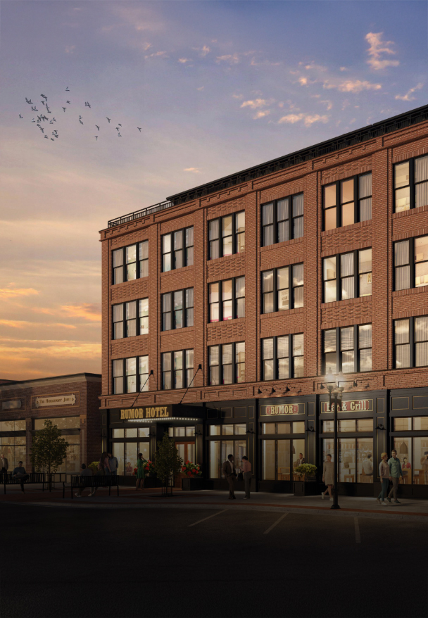 a building with many shops and people walking on the street