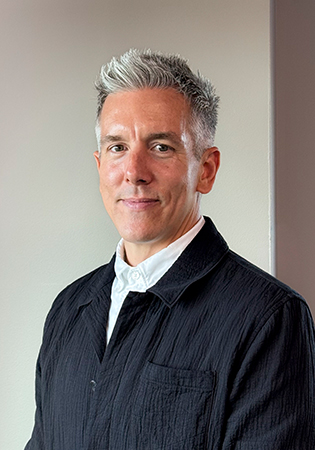 a man in a black jacket