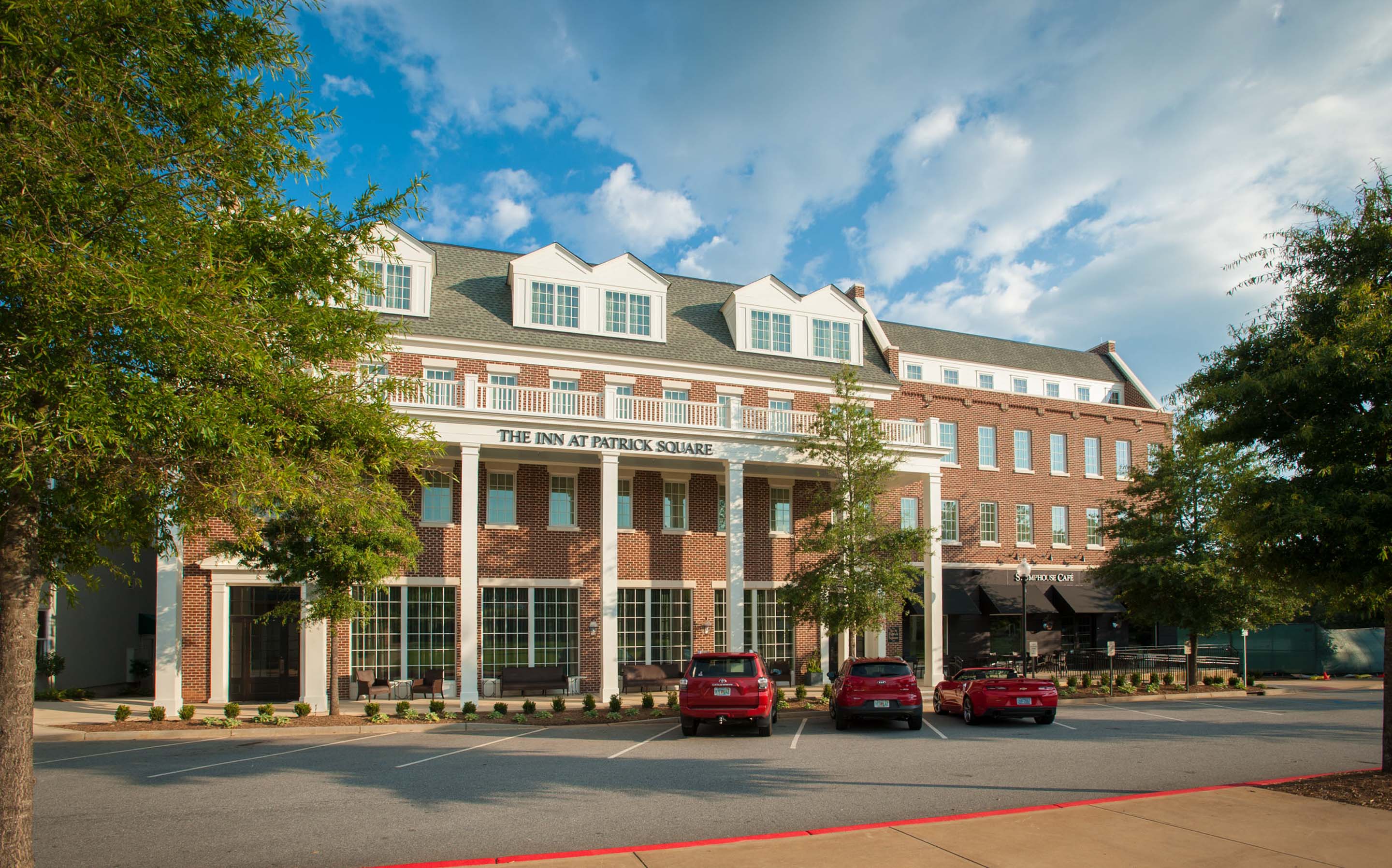 a building with cars parked in front of it