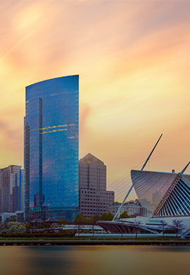 a city skyline with tall buildings