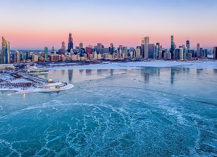 chicago skyline with a frozen lake